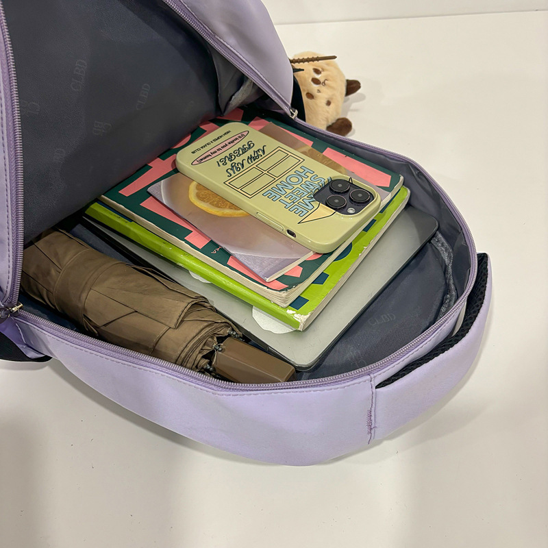 A new Japanese-style backpack with a high aesthetic level, fresh and sweet candy color, is simple, lightweight and has a large capacity for junior and senior high school students Application Scenario