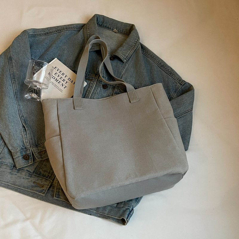 A new Korean-style canvas large bag for women, simple and casual hand-held shoulder bag, versatile texture, student tote bag for class Specification drawing