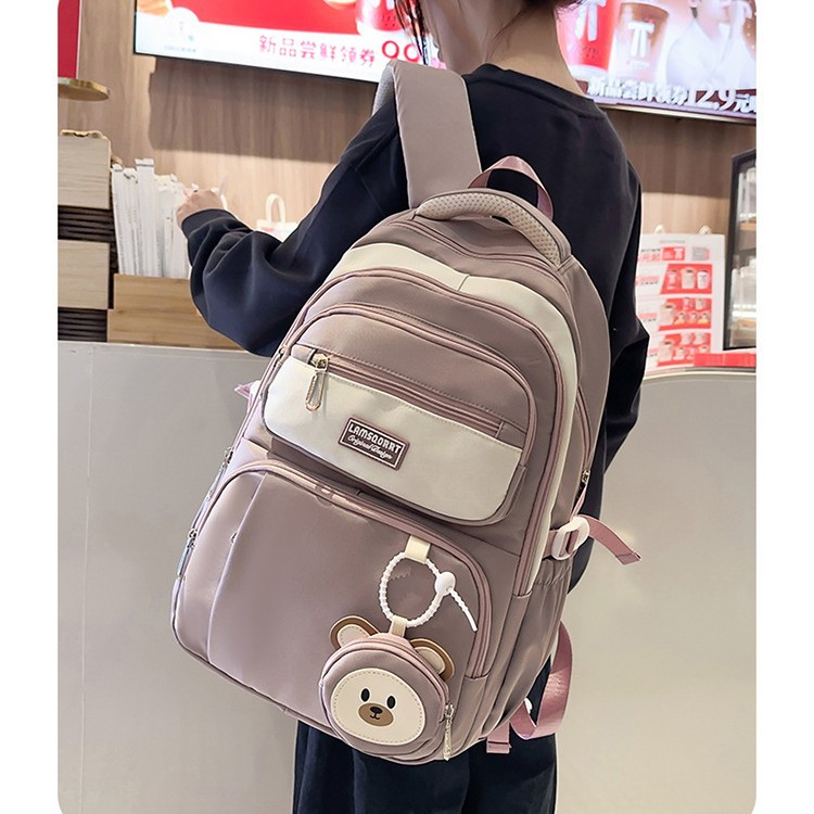 The new schoolbag for primary school girls is cute and fresh, with a light burden and back support. It is also a lightweight and large-capacity backpack for junior high school students details Picture