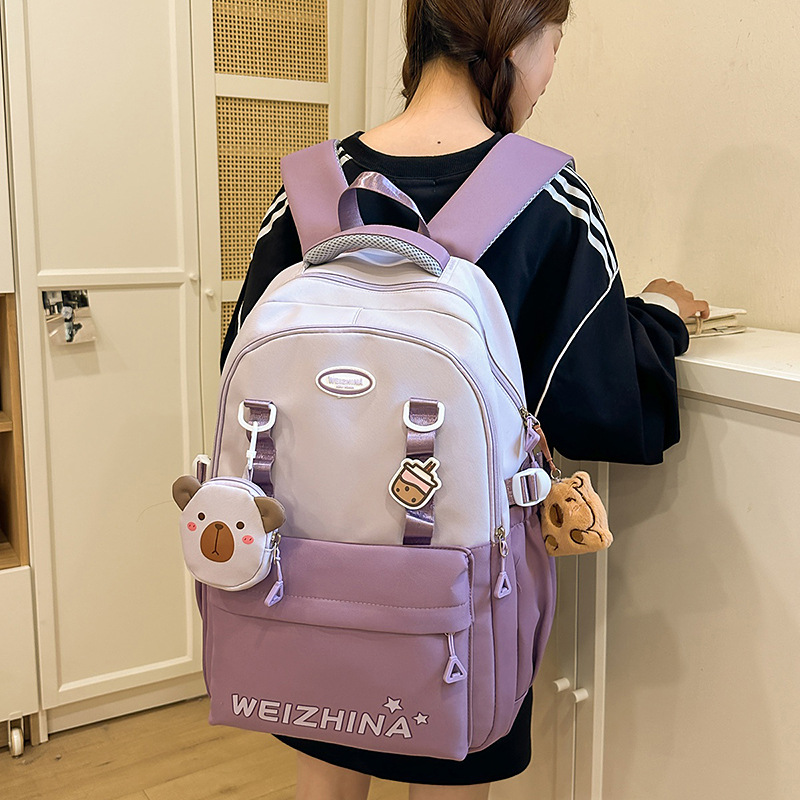 A new high-appeal, fresh and sweet macaron-colored cute puppy backpack for junior and senior high school students, a color-matched lightweight backpack details Picture