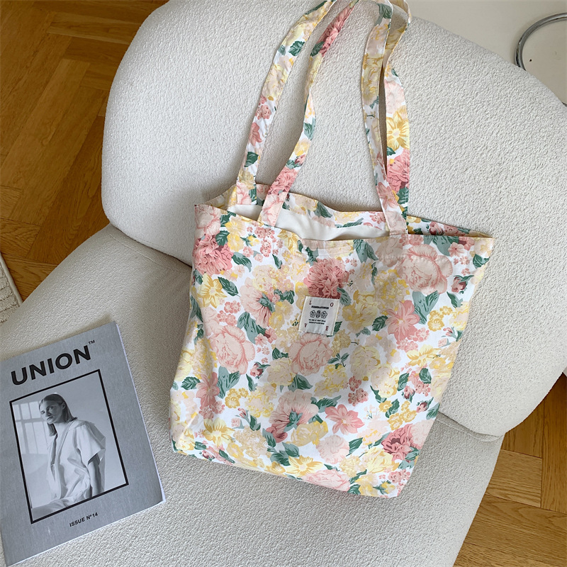 Wholesale of 26101 Spring/Summer New flower cotton single-shoulder bag, large-capacity tote bag, women's hand-held student shopping bag details Picture