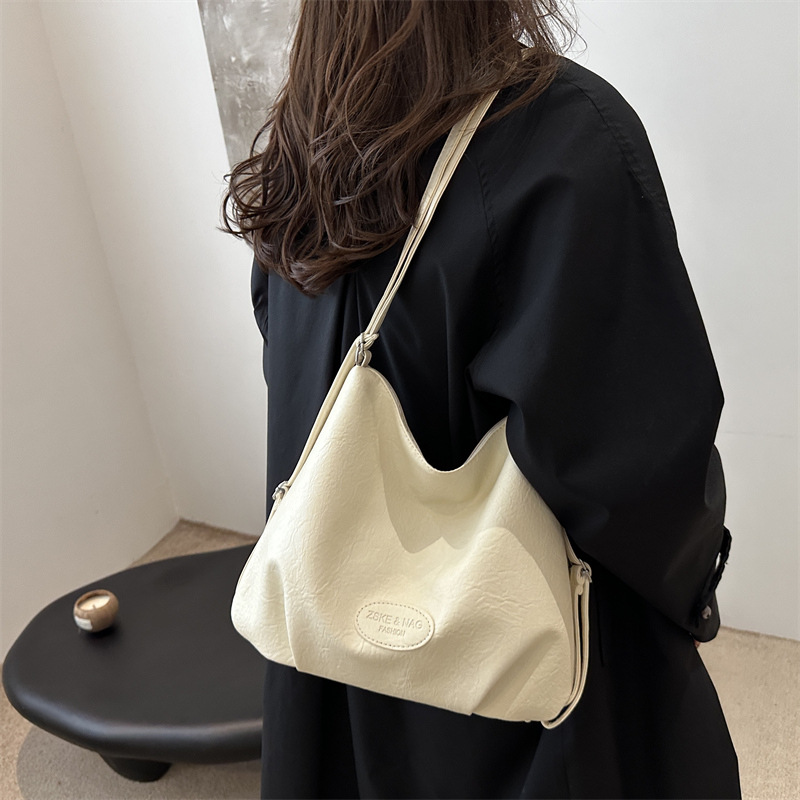 Popular casual 2024 retro new large-capacity commuting solid color trendy multi-functional backpack single-shoulder tote women's bag details Picture