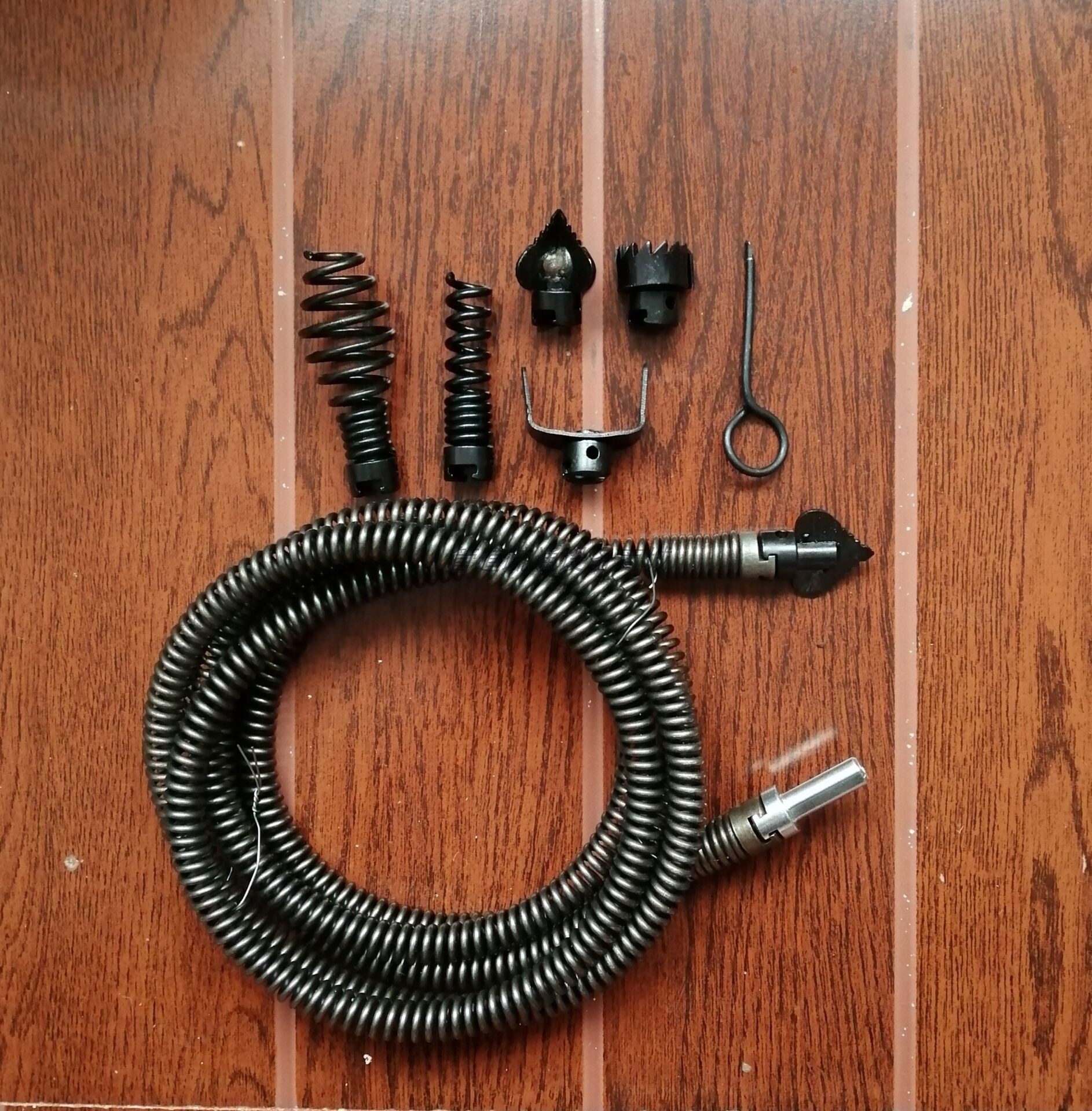 The spring diameter of the household electric drill unclogging device is 16mm. It is a soft spring used to unclog sewer pipes undefined