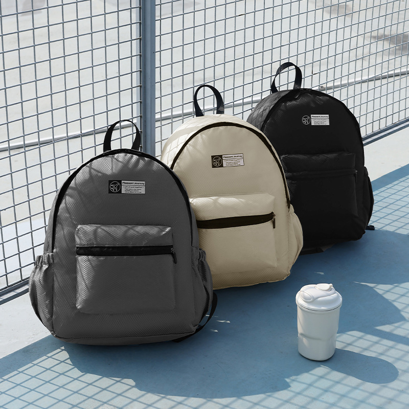 Runhui's new diamond-shaped checkered backpack is a foldable backpack for travel, a lightweight student schoolbag, and a backpack for women full figure
