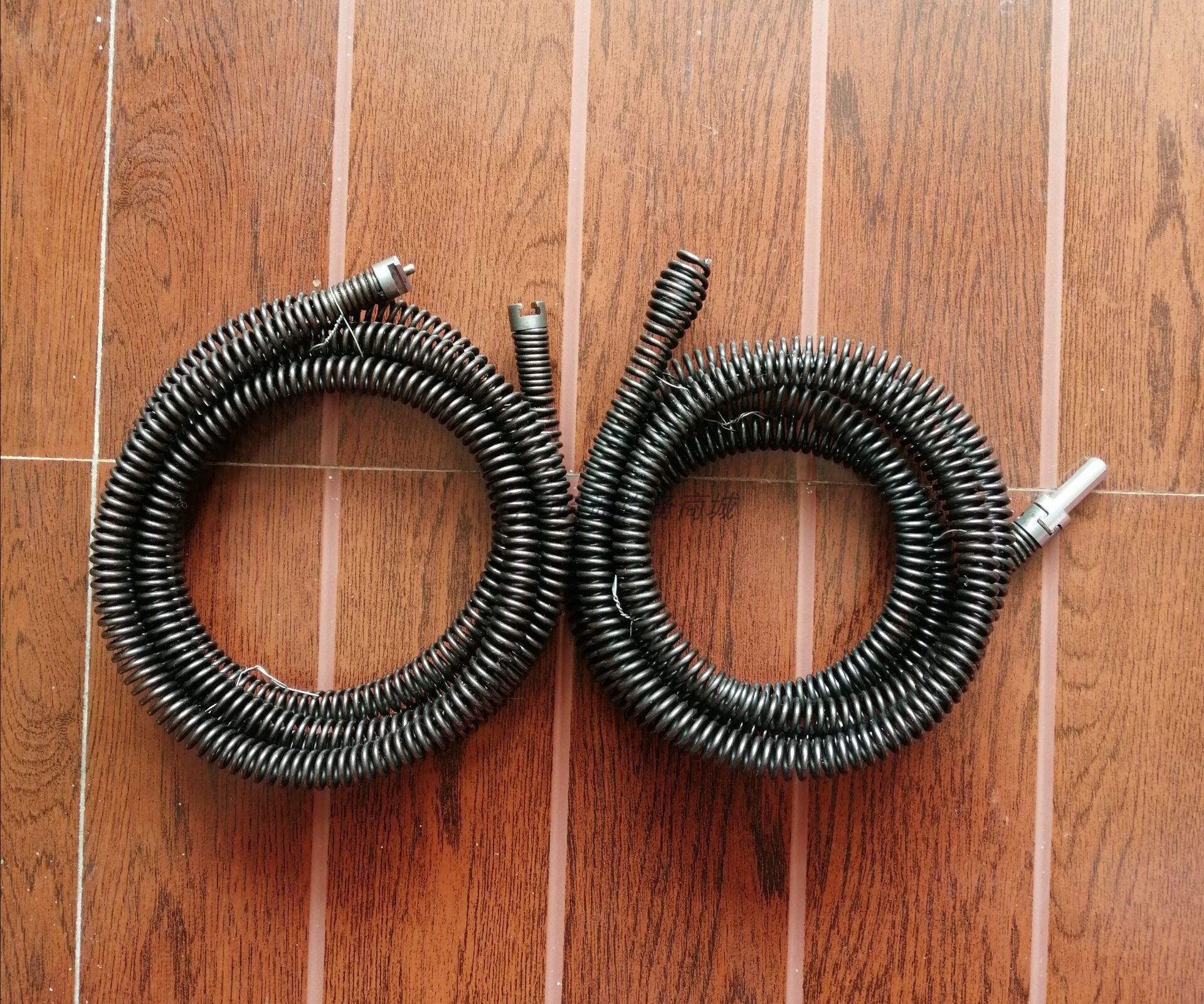 The spring diameter of the household electric drill unclogging device is 16mm. It is a soft spring used to unclog sewer pipes undefined