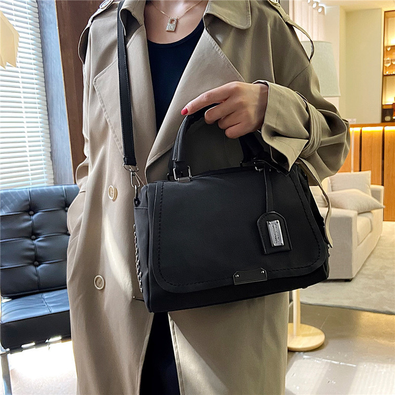 2024 New style women's bag, Korean rivet women's bag, large capacity hand-held shoulder crossbody bag, matte leather retro women's bag details Picture