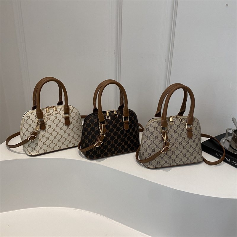 Casual, fashionable, simple and large-capacity women's bag 2024 Cross-border new style, stylish commuting single-shoulder shell hand-held crossbody bag details Picture