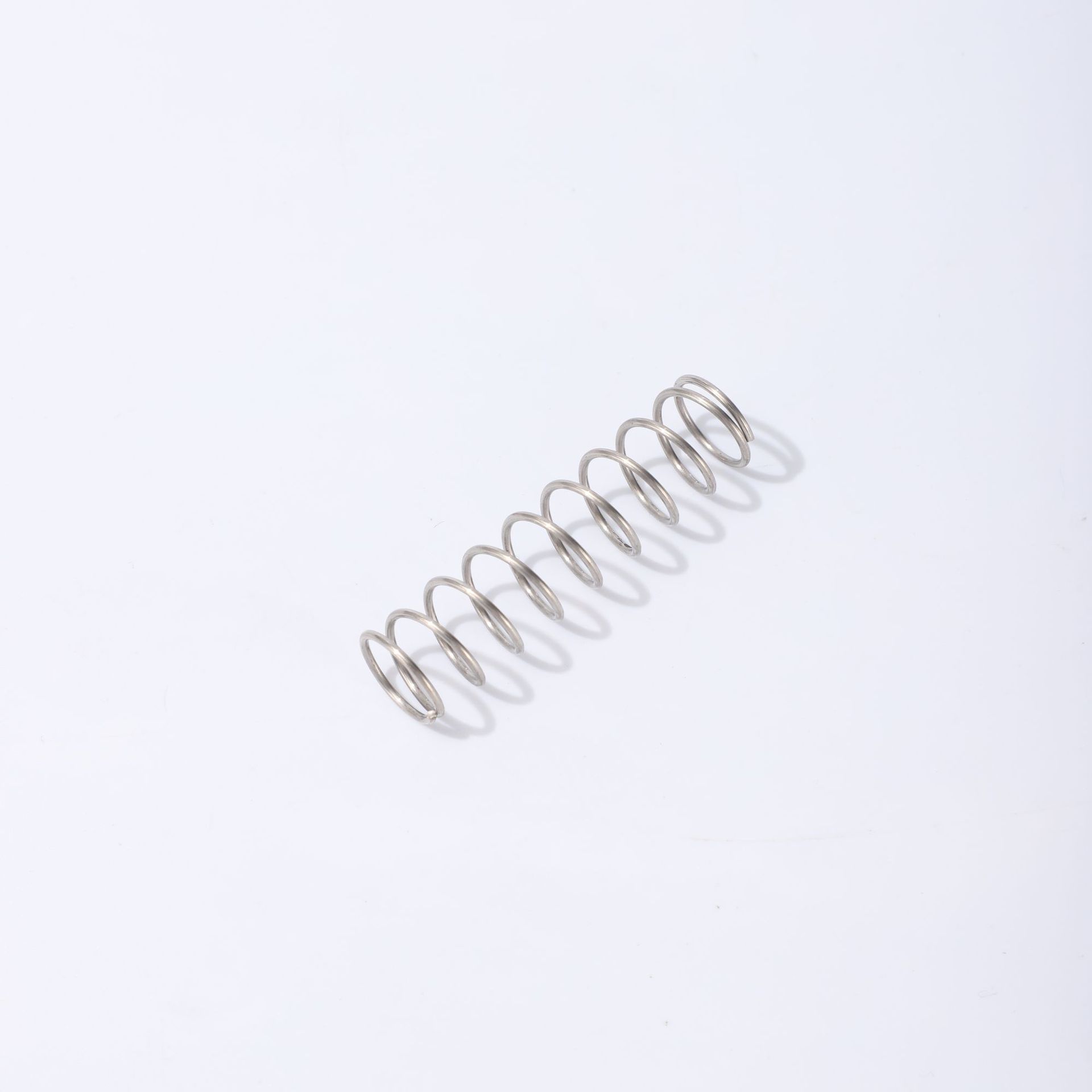 Steel wire stainless steel pressure spring, high-elasticity electroplated pressure spring, anti-collision and shock-absorbing industrial spring return pressure spring Application Scenario
