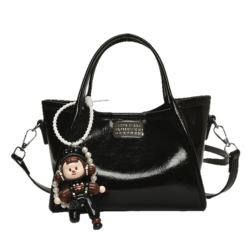 Korean high-end and fashionable hand-held bucket bag for women 2025 new style, fashionable and versatile, niche design, single-shoulder crossbody bag Item Picture