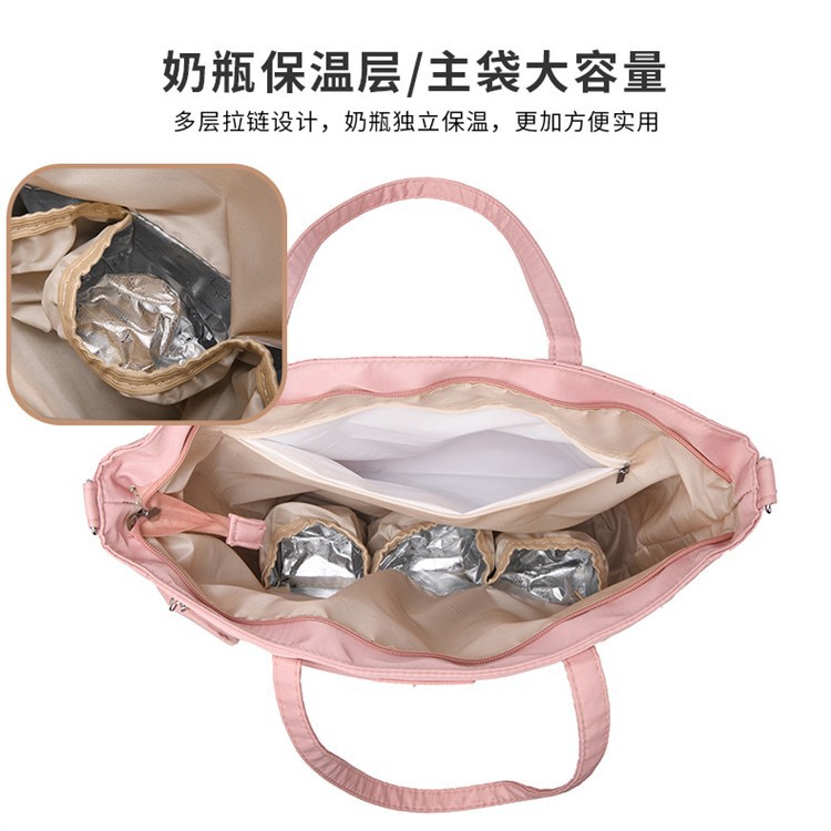 New trendy waterproof hand-held crossbody bag, large-capacity mommy bag, hand-held bag, baby bag, portable diaper bag for going out Application Scenario