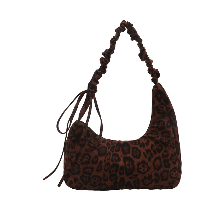 This is a new large-capacity crossbody tote bag for women in the autumn of 2024, featuring a leopard print fashion commuting single-shoulder bag Item Picture