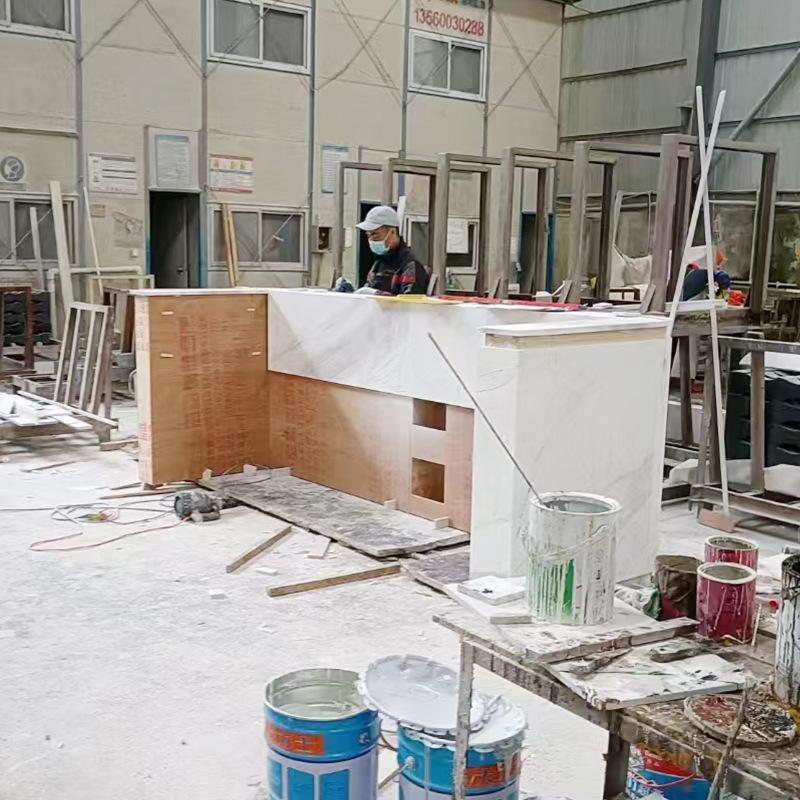 Customized marble for the front desk, bar counter, background wall, washbasin, fence and staircase from the original manufacturer details Picture