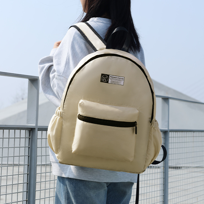 Runhui's new diamond-shaped checkered backpack is a foldable backpack for travel, a lightweight student schoolbag, and a backpack for women details Picture