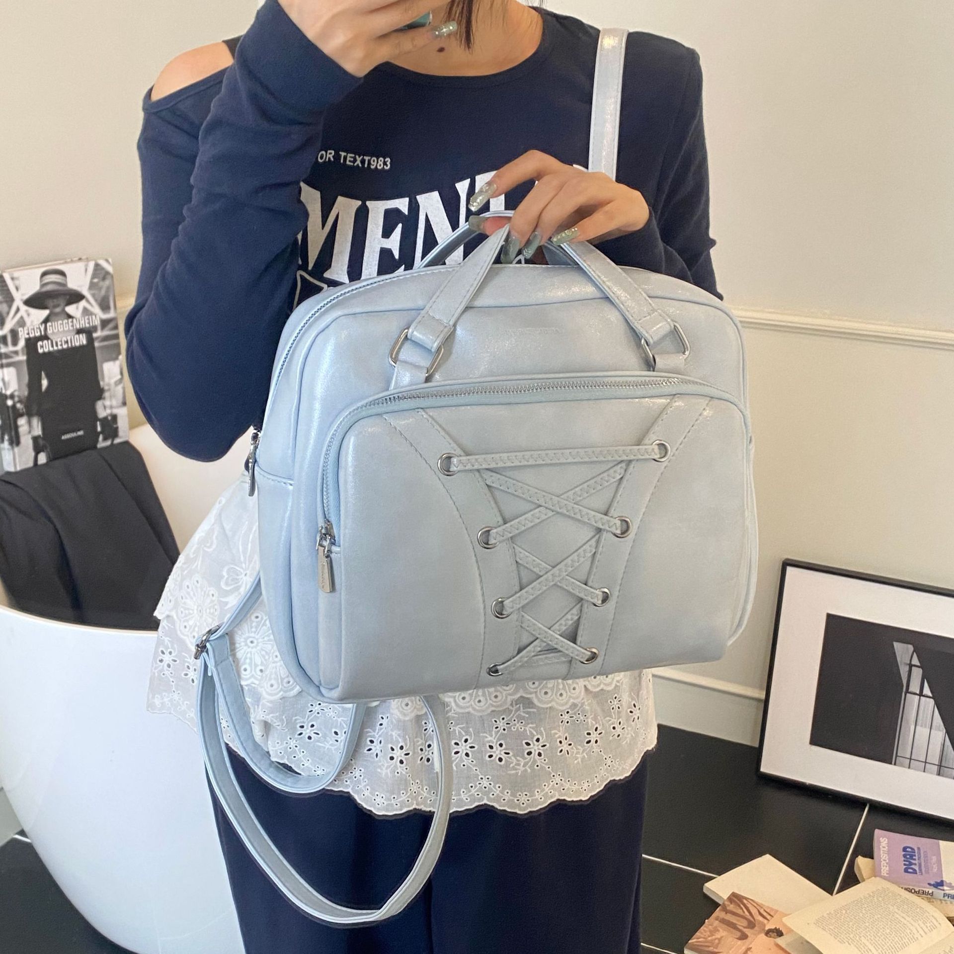 A fashionable hand-held Boston backpack for women in spring 2025, featuring a trendy, casual, versatile large capacity and a high-end feel details Picture