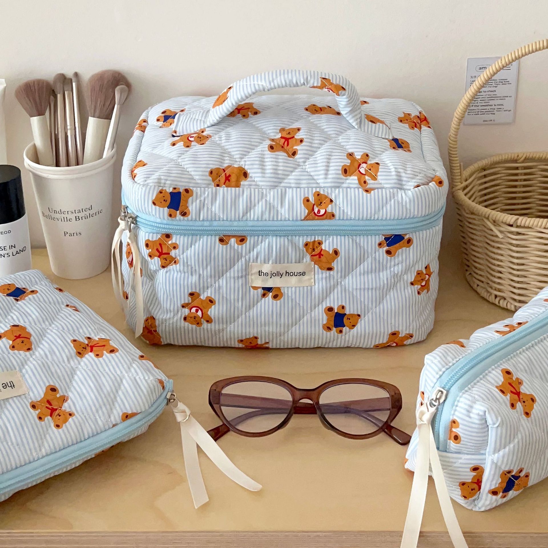 2024 New style makeup bag, Cartoon bear, large-capacity portable hand-held travel cosmetics storage bag, toiletry bag for women details Picture