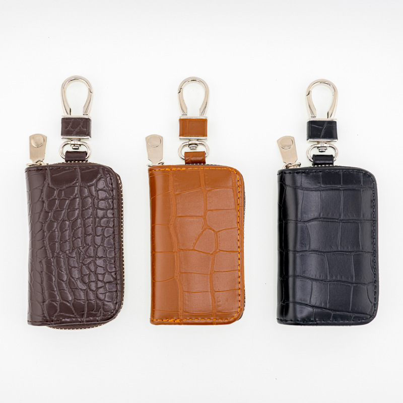 This new crocodile-patterned men's business, trendy and fashionable car key case is a bestseller in Europe and America. It is lightweight and portable, the same style for home use full figure