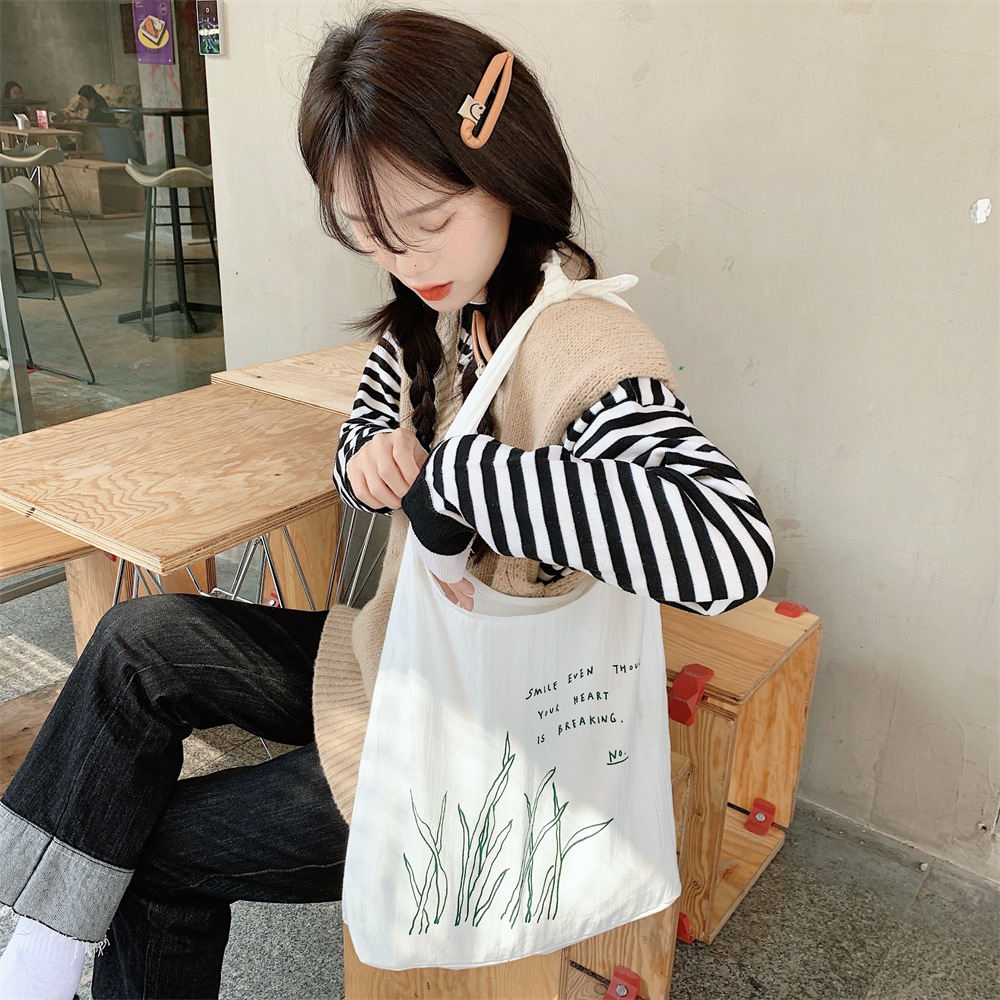 22274 Fresh printed small green leaf lace-up vest bag, large-capacity canvas bag, student schoolbag for class, casual bag details Picture