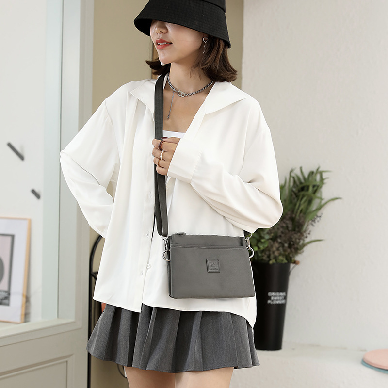 New cross-border women's bag: Casual women's single-shoulder bag in solid color, simple crossbody bag, casual nylon bag, mobile phone bag for women details Picture