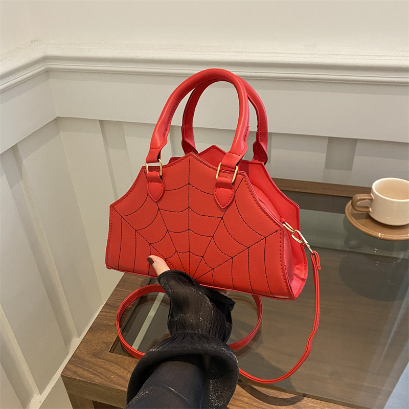 A new 2024 stylish spider and funny crossbody bag with a simple and elegant ins embroidery thread full figure
