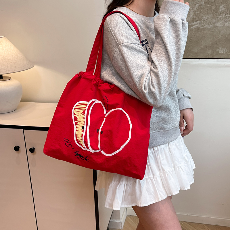 Summer lightweight drawstring fabric bag for students, easy to use for commuting, versatile shoulder bag, niche, large capacity, simple and convenient for the group full figure