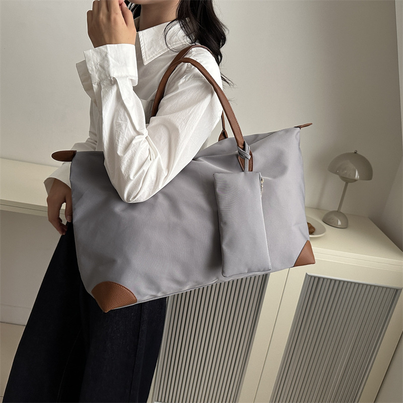 Commuter Tote bag for Women 2024 New style, high-end hand-held travel dumpling bag, fashionable single-shoulder large capacity mommy bag details Picture