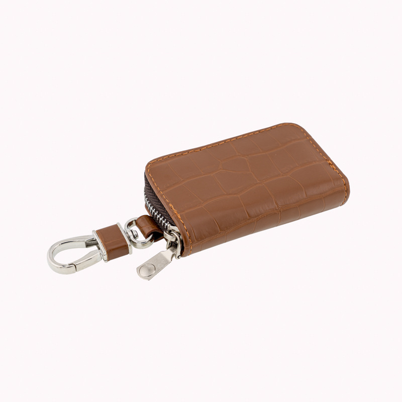 This new crocodile-patterned men's business, trendy and fashionable car key case is a bestseller in Europe and America. It is lightweight and portable, the same style for home use Application Scenario