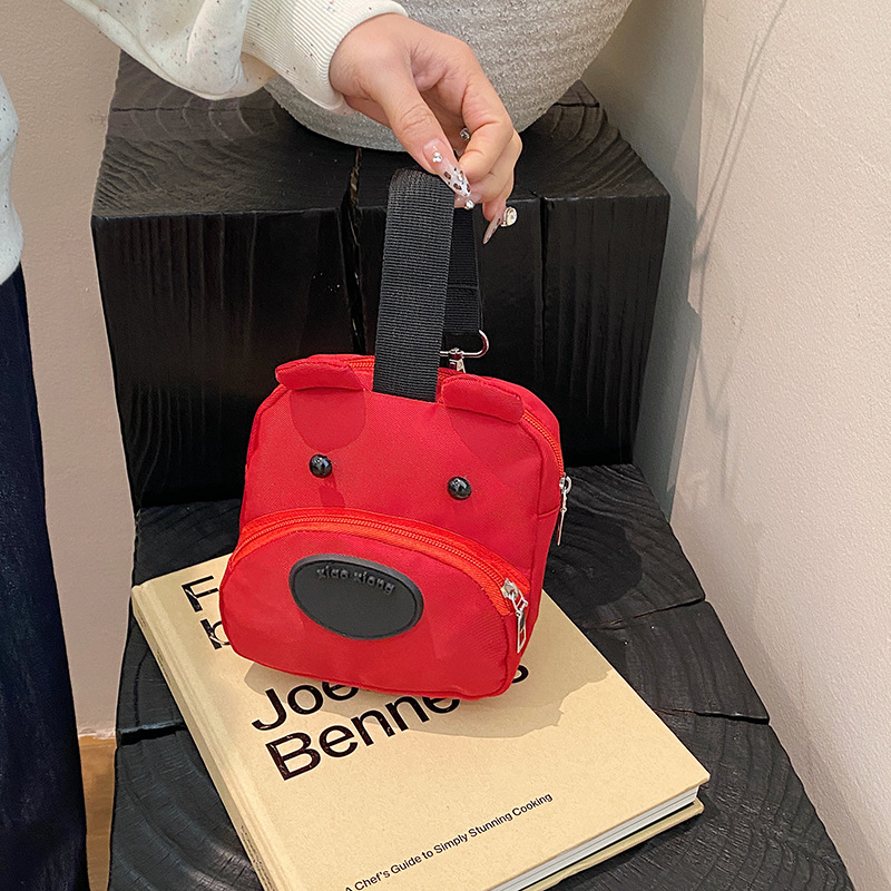 Wholesale of cute puppy mobile phone bags, best-selling hand-held storage small bags, packaging for loose change and cosmetics, women's hand-held canvas bags details Picture