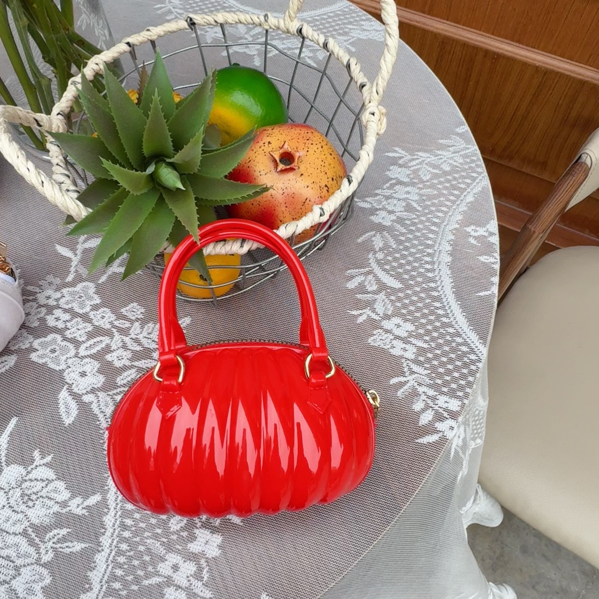 The 2025 autumn new women's handbag, hand-held crossbody bag, PVC bag, small pumpkin-shaped bag, creative bag, fashionable and fresh Item Picture
