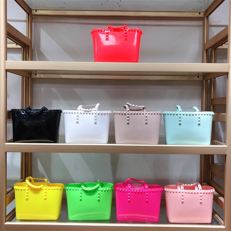 New riveted jelly bags, handbags, bucket bags, shopping bags, large-capacity pvc women's bags from Europe and America in 2025 full figure