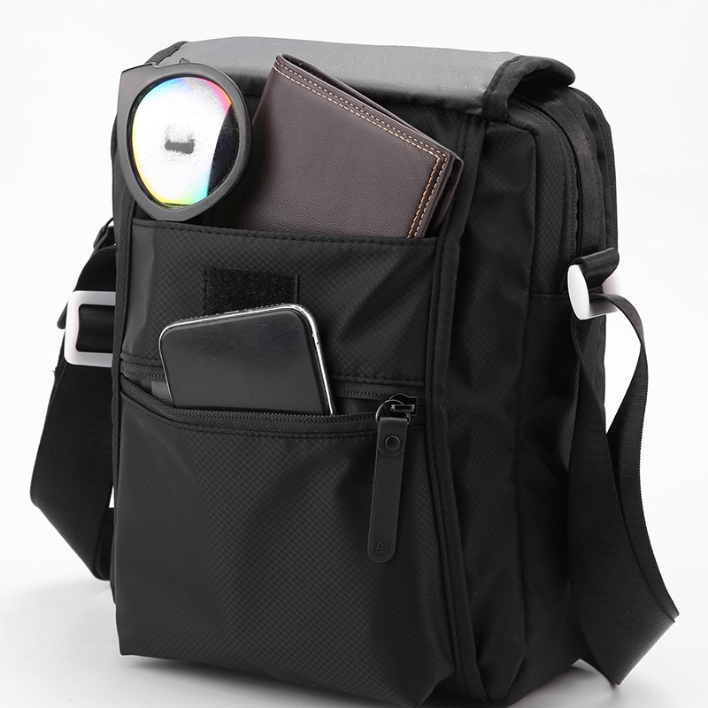 A new large-capacity casual shoulder bag for men, made of nylon fabric, and a small square hand-held bag for men Application Scenario