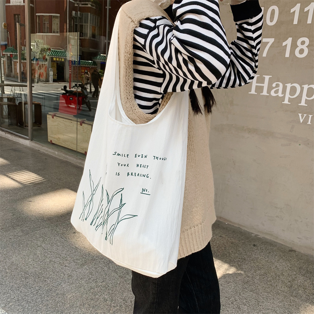 22274 Fresh printed small green leaf lace-up vest bag, large-capacity canvas bag, student schoolbag for class, casual bag Application Scenario