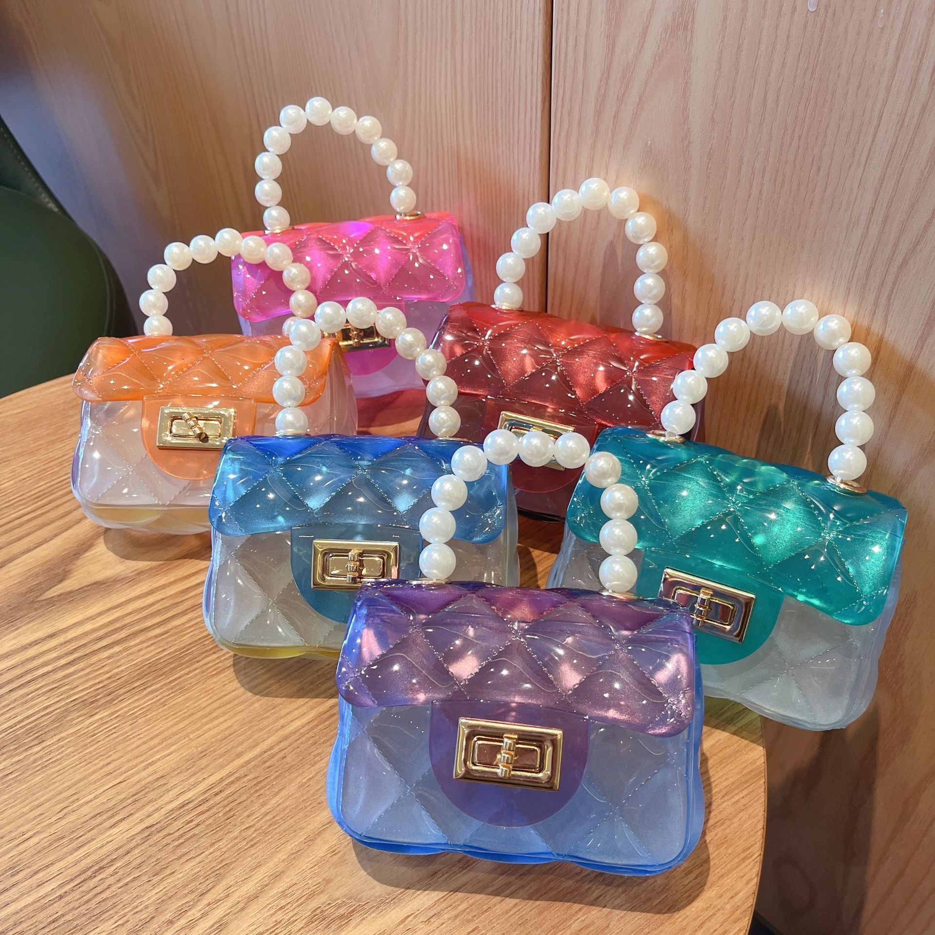 2025 Summer New transparent PVC jelly bag, mini pearl hand-held square bag, single-shoulder crossbody women's bags full figure
