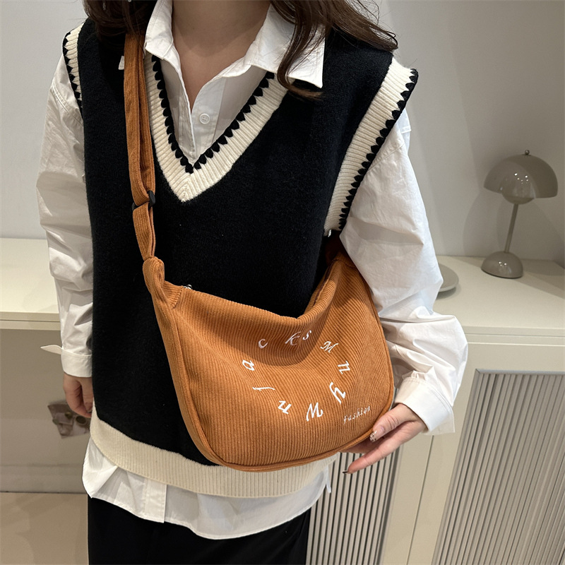 A niche design letter-embroidered tote bag, a women's corduroy single-shoulder bag, a crossbody bag, and a large-capacity casual bag details Picture
