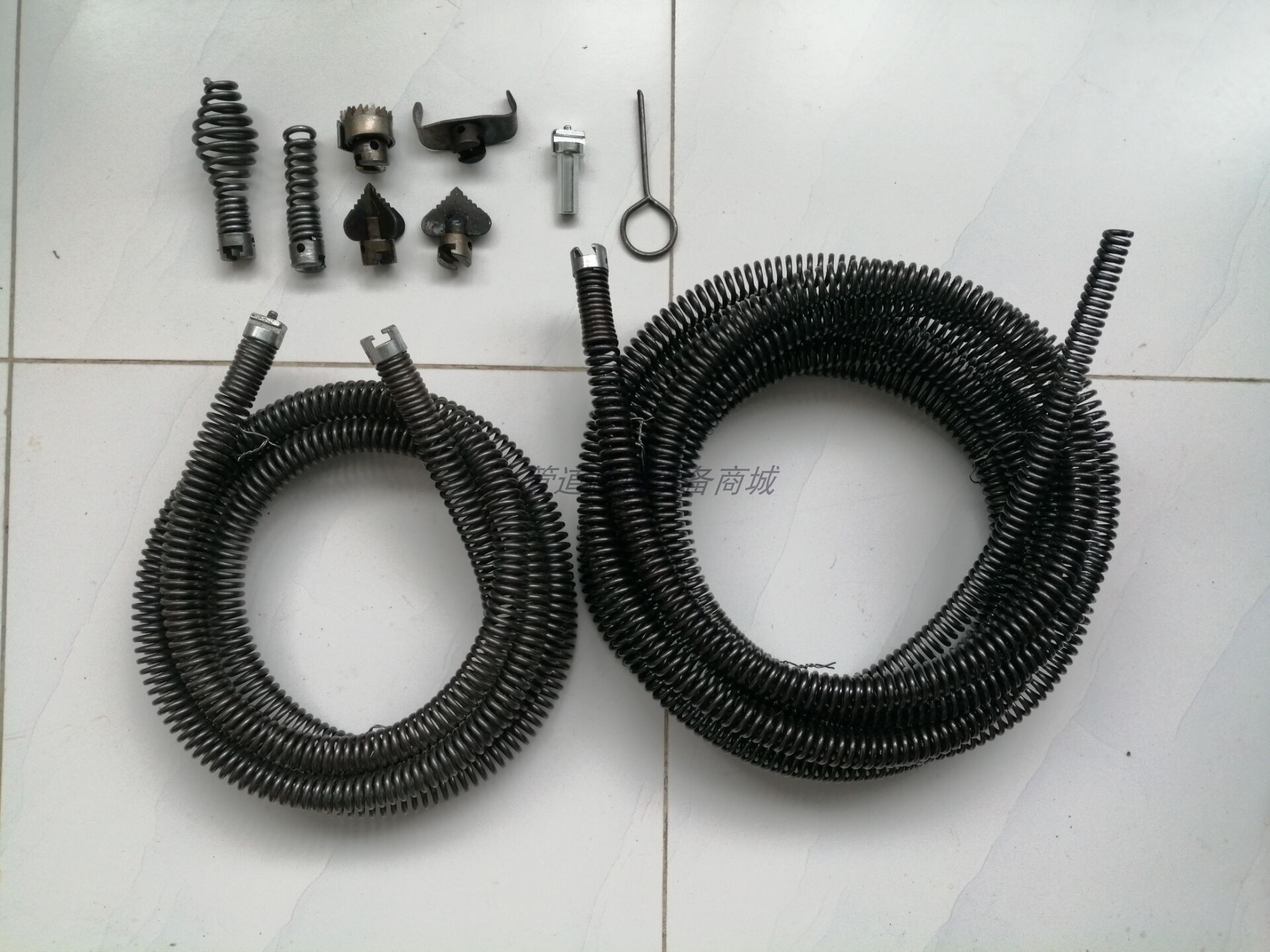 The spring diameter of the household electric drill unclogging device is 16mm. It is a soft spring used to unclog sewer pipes undefined