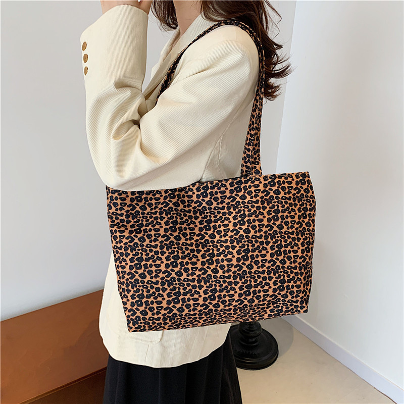 Leopard print canvas casual large-capacity 2024 new trendy autumn and winter stylish commuter hand-held shoulder tote bag for women details Picture