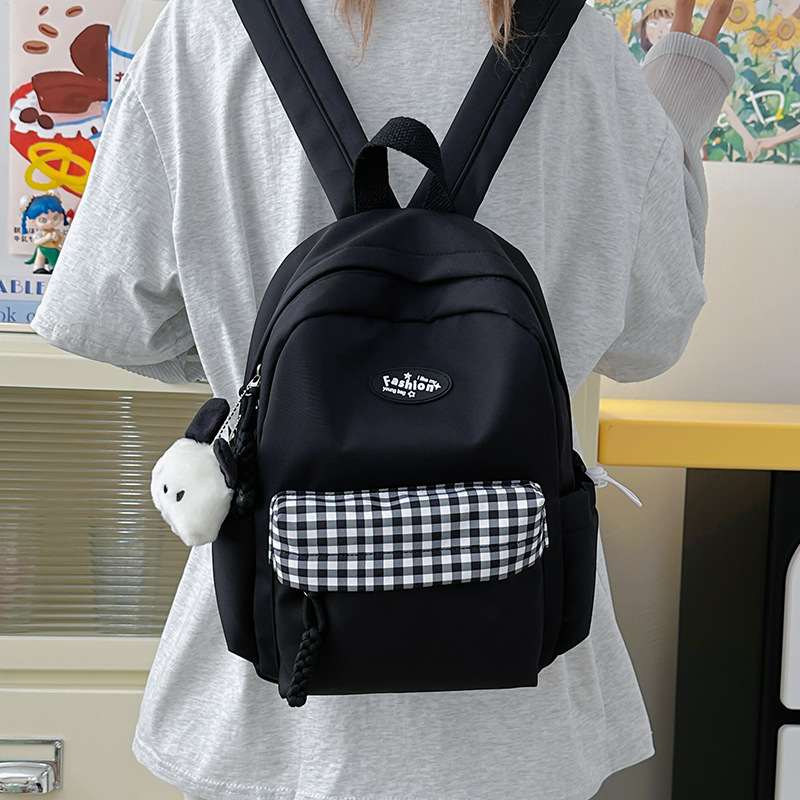 2025 Japanese student campus backpack for girls, Korean InS-style artistic and fresh checkered schoolbag, versatile backpack Application Scenario