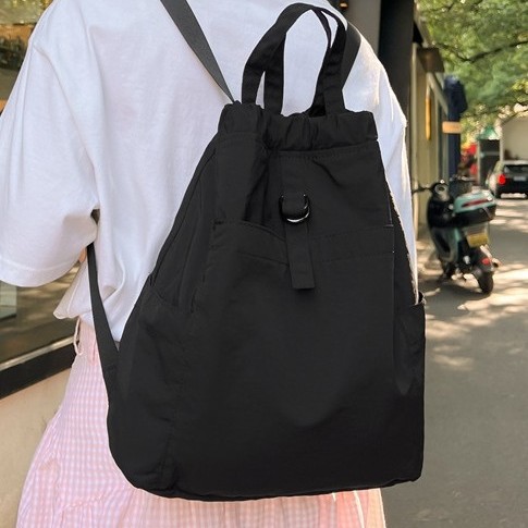New cross-border lightweight hand-held fabric bag, artistic girl's shrink backpack, casual, exquisite, trendy and versatile handbag full figure