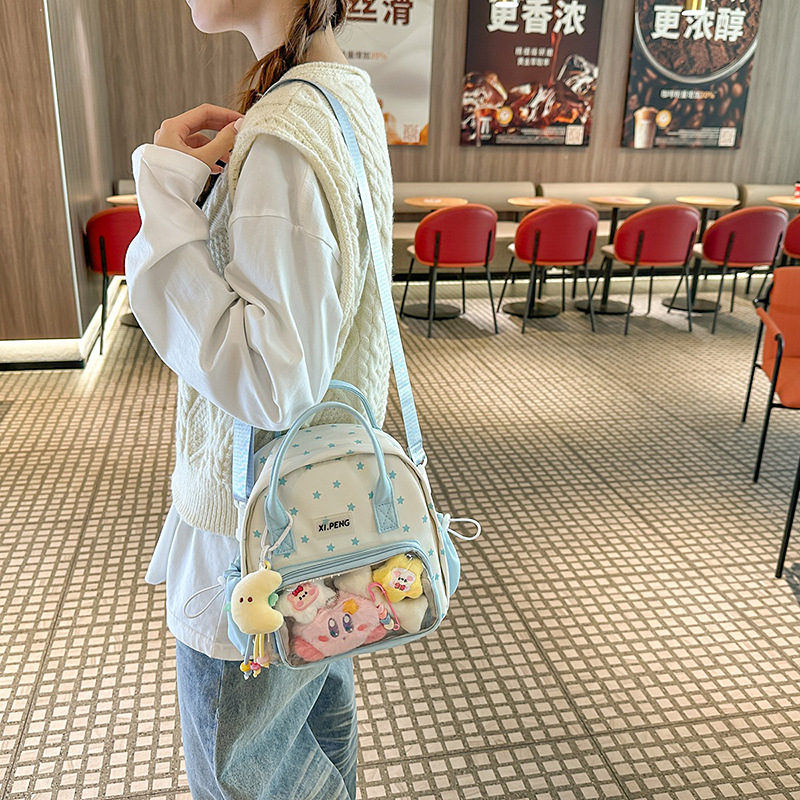 A super cute new Japanese-style Instagram backpack in the 2D world, a transparent and cute girl's backpack, and a cute college student's schoolbag full figure