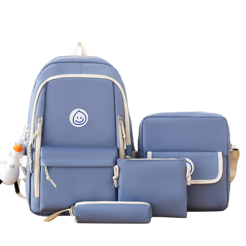 A new four-piece set of schoolbag for foreign trade, a simple and solid Korean-style forest-themed backpack with a large capacity and a fresh look for women Item Picture
