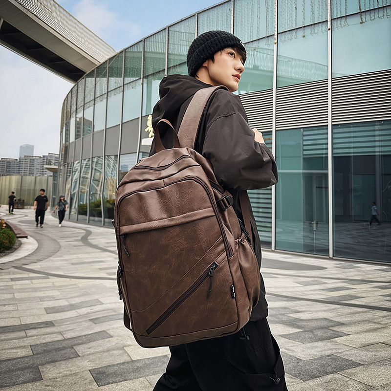 New large-capacity backpack for male college students, fashionable schoolbag, computer bag, travel backpack, casual student full figure