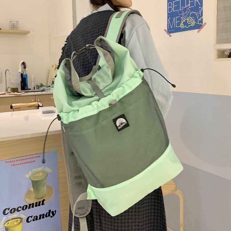A new large-capacity casual backpack for students, a color-blocking outdoor hiking bag, and a unisex backpack for travel Application Scenario