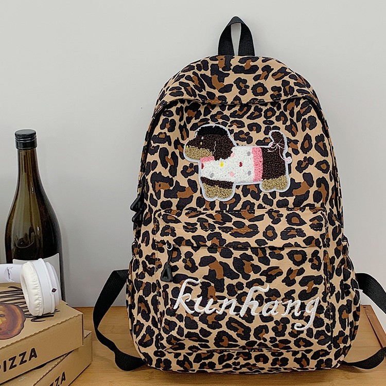 Casual student, simple and casual Korean version of Harajuku High School, large-capacity leopard print Japanese style backpack, trendy student backpack Application Scenario