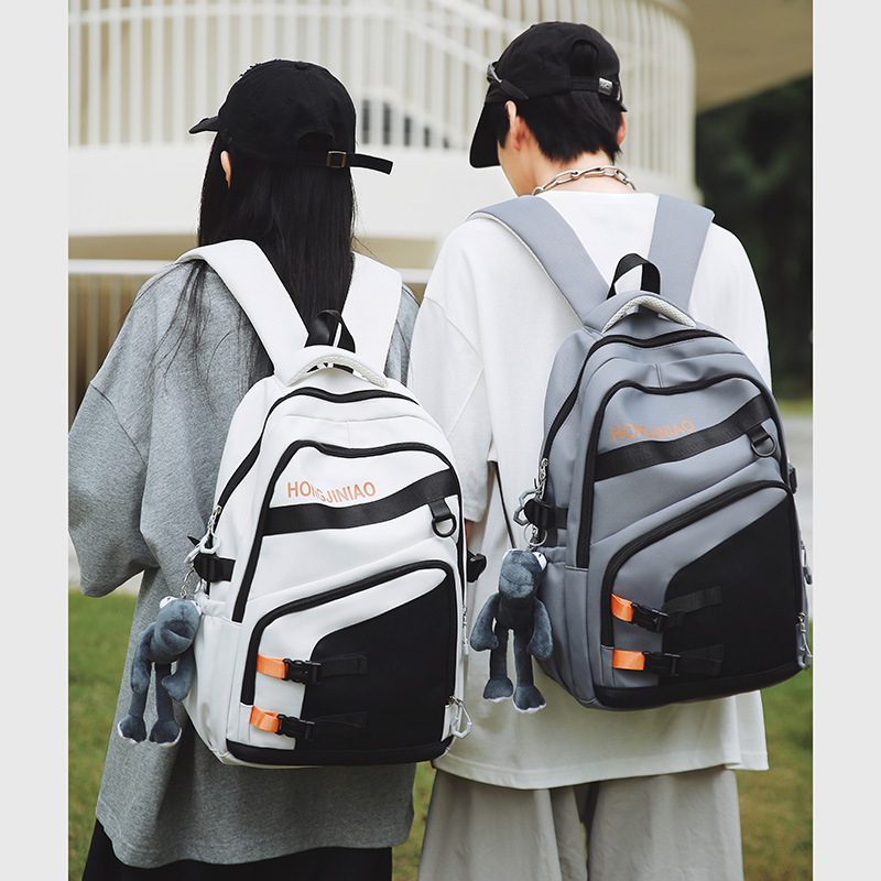 The new super cool backpack features a high level of appearance. It's a large-capacity Korean-style schoolbag for primary and secondary school students with a simple color contrast and a backrest for women details Picture