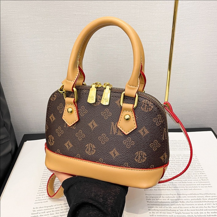 Cross-border high-end texture retro monogram hand-held shell bag for women, 2025 new trendy and versatile single-shoulder crossbody bag full figure
