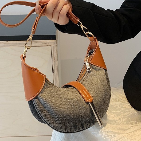 The new 2024 fashion contrasting color versatile single-shoulder underarm bag, fashionable denim dumpling bag, and niche hand-carried croissant bag details Picture