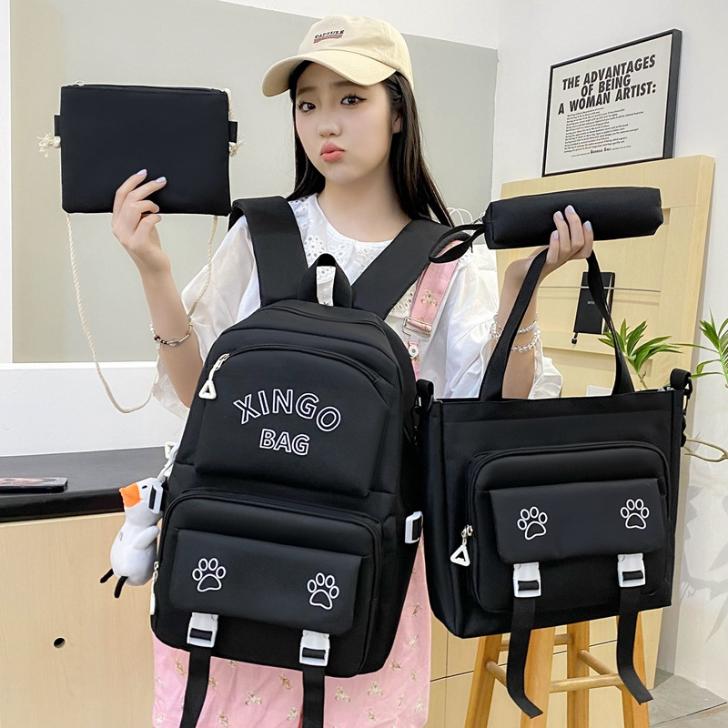 Four-piece Korean-style schoolbag for girls, solid-color printed schoolbag, simple and large-capacity backrest backpack for junior high school students Application Scenario