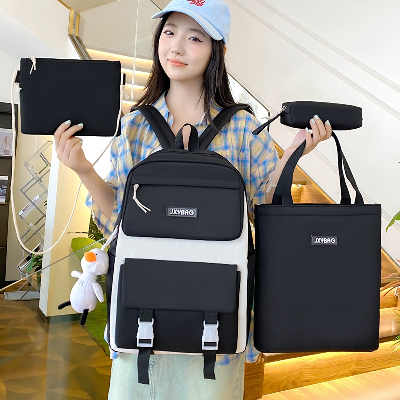 Four-piece Korean-style girls' schoolbag, simple, large-capacity, solid-color backpack for grades five and six, junior high school students, backpack for girls full figure