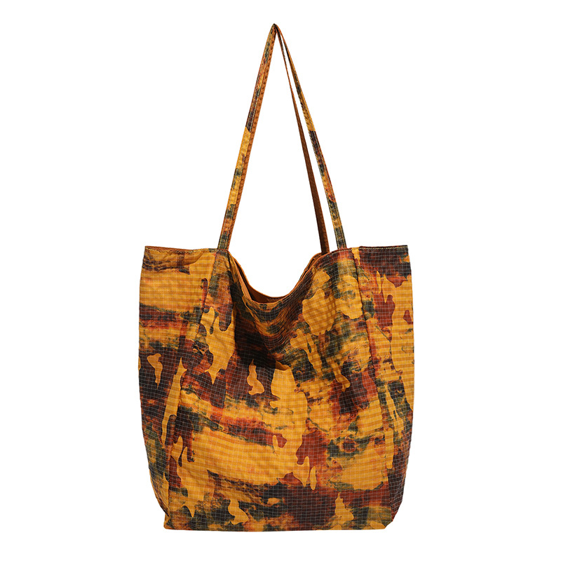 Summer's new trendy fabric backpack, camouflage dazzling, large-capacity, lightweight, simple and fashionable backpack Item Picture