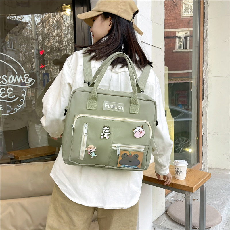 A new Japanese-style color-blocking, fresh and light crossbody handbag for girls, a simple and artistic large-capacity backpack full figure