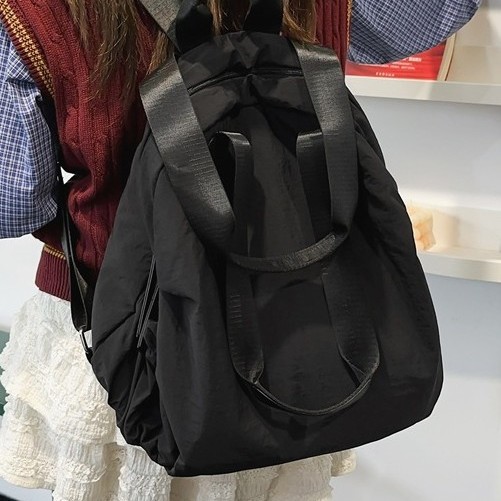 Japanese fashion trend large-capacity schoolbag, casual sports backpack, backpack for junior and senior high school students, solid-color backpack Specification drawing